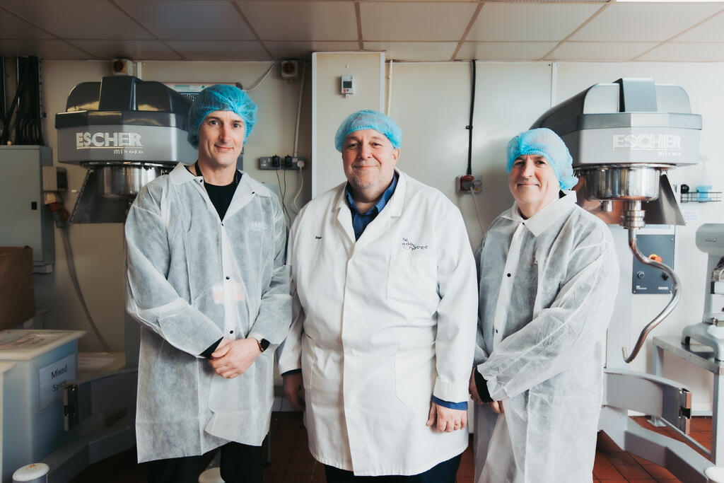 L-R: Jason Murphy, , strategy and commercial director at AMRC Cymru, Steve West, founder of The Pudding Compartment and Michael Evans, CEO of EBS Automation